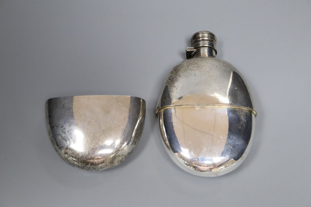 A late Victorian silver oval hip flask, Sampson Mordan & Co, London, 1895, 14.2cm, gross 7oz.